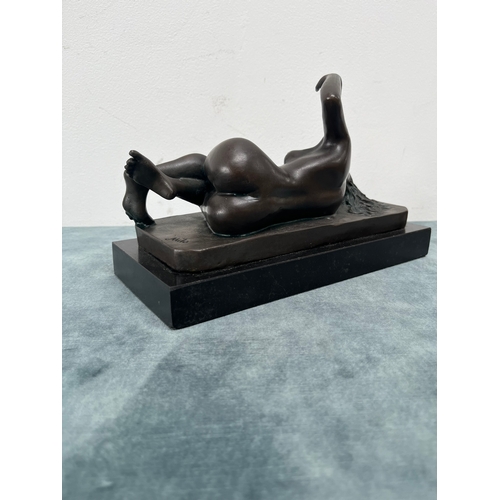 214 - Modern bronze of a reclining nude lady