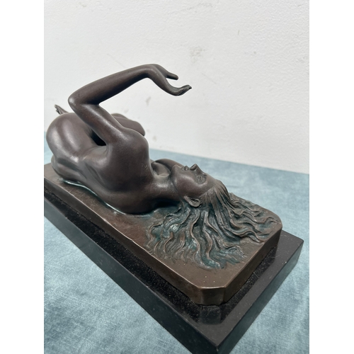 214 - Modern bronze of a reclining nude lady