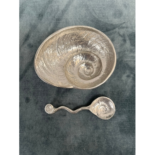 252 - Small ammonite/ shell shaped silver plate bowl with matching spoon