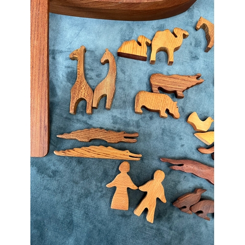 262 - Wooden carved model of Noah's Ark along with wooden animals