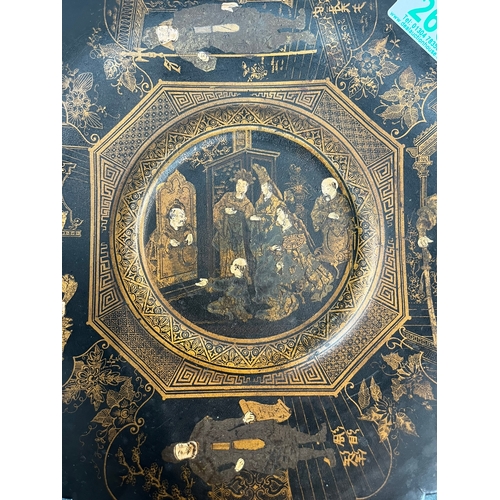 266 - Black lacquer oriental Chinese plate paper mache. Decorated with gold gilt and chinoiserie