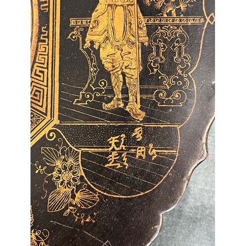 266 - Black lacquer oriental Chinese plate paper mache. Decorated with gold gilt and chinoiserie