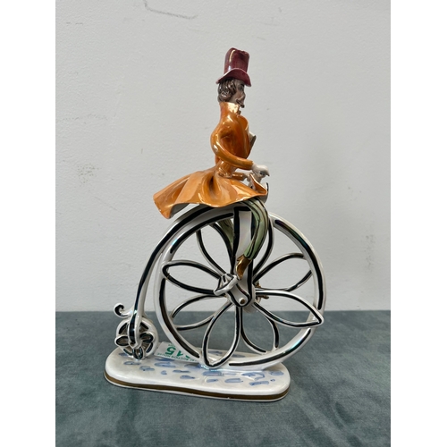 315 - Italian porcelain man riding a penny farthing