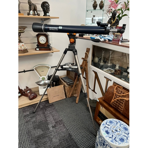 351 - Celestron AstroMaster 90 telescope on stand