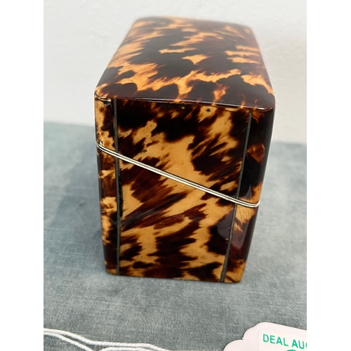 375 - Small tortoiseshell box with velvet interior