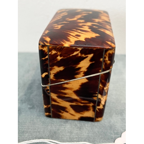 375 - Small tortoiseshell box with velvet interior