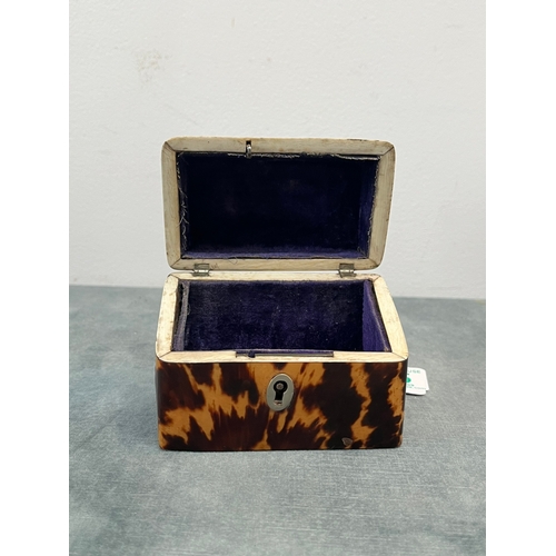 375 - Small tortoiseshell box with velvet interior