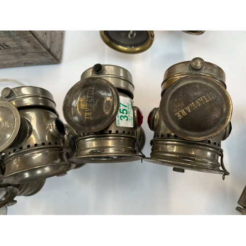 357 - Group of four G.H. Vitaphare carbide lamps