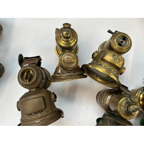 358 - Five various brass carbide lamps