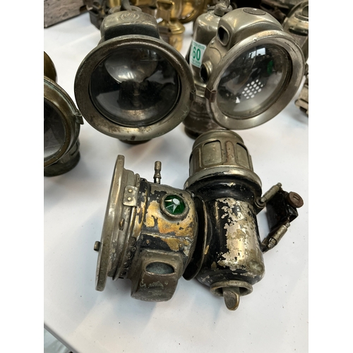 360 - Four various carbide lamps