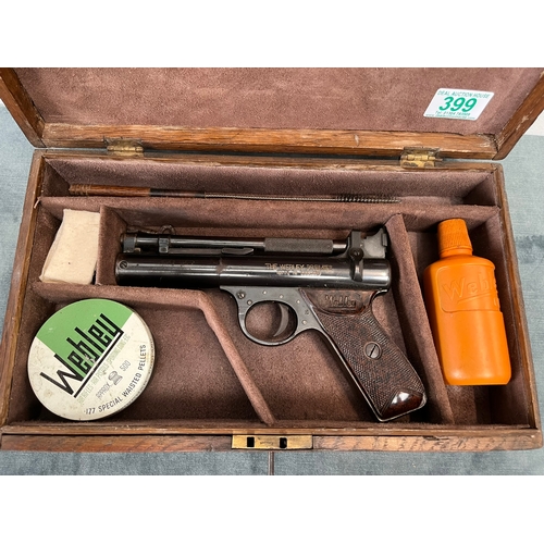 399 - Cased Webley Premier .22 pistol. 1950's, with age related accessories