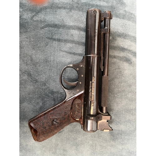 399 - Cased Webley Premier .22 pistol. 1950's, with age related accessories