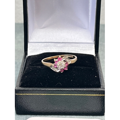 612 - 9ct gold and diamond chip ring with pink stones 1.7g