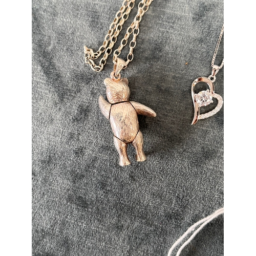 654 - Silver articulated teddy bear necklace + one other silver necklace