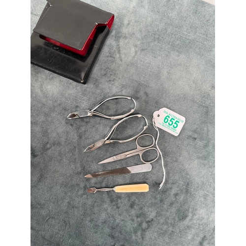 655 - Gucci leather cased manicure set