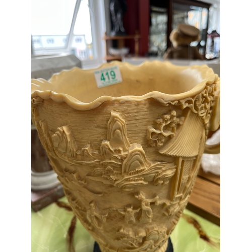 419 - Large resin vase featuring elephants and oriental scenes