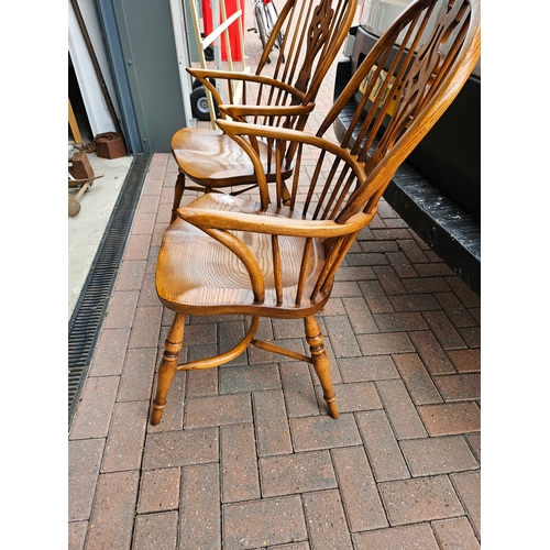 5 - Titchmarsh & Goodwin pair of Windsor stick back carver chairs with crinoline stretcher