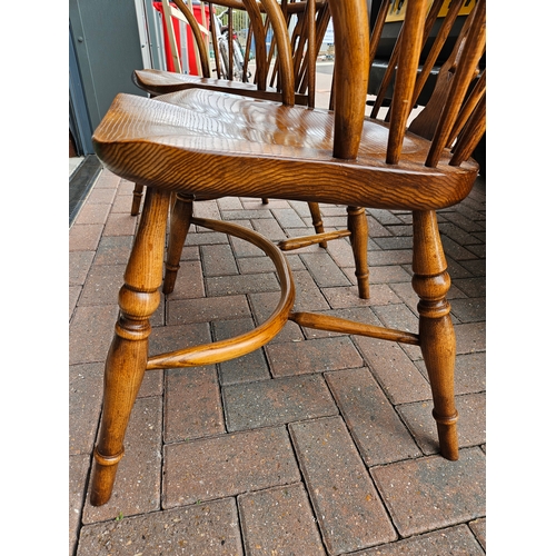 5 - Titchmarsh & Goodwin pair of Windsor stick back carver chairs with crinoline stretcher