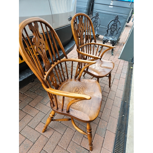 5 - Titchmarsh & Goodwin pair of Windsor stick back carver chairs with crinoline stretcher