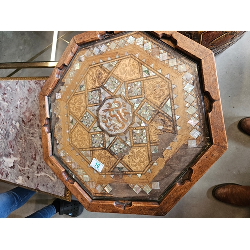 10 - Hexagonal highly decorated table. Mother of pearl and burr woods.