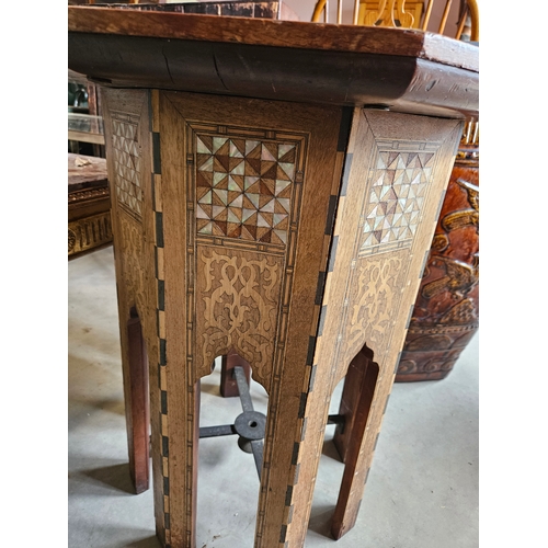 10 - Hexagonal highly decorated table. Mother of pearl and burr woods.