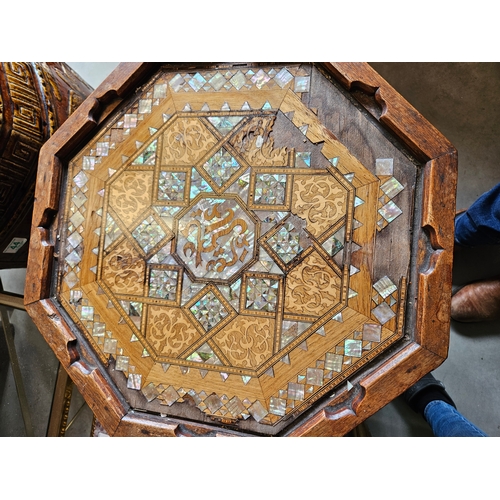 10 - Hexagonal highly decorated table. Mother of pearl and burr woods.