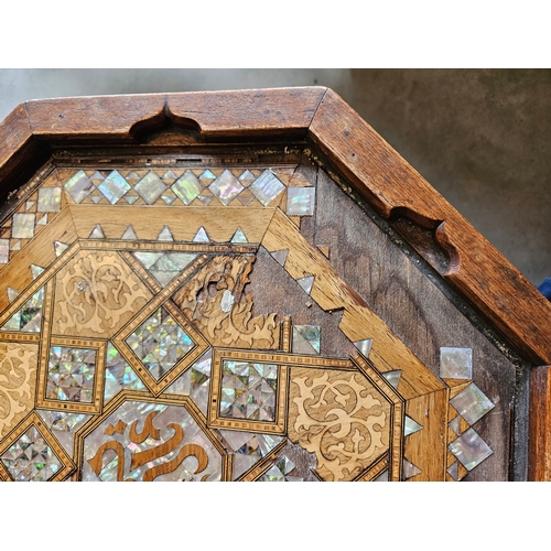 10 - Hexagonal highly decorated table. Mother of pearl and burr woods.