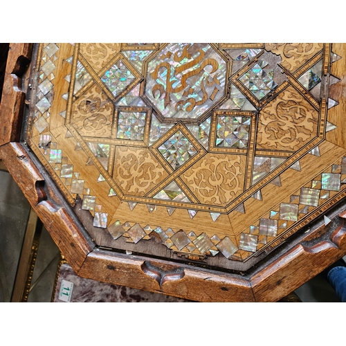 10 - Hexagonal highly decorated table. Mother of pearl and burr woods.