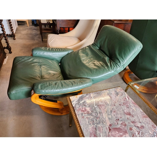 13 - Green leather swivel and recline armchair - Himolla