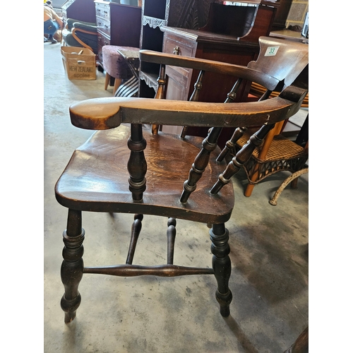 33 - Antique elm captains chair