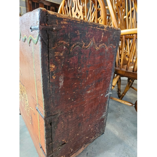 60 - A Tibetan polychrome tiger chest, 18th century, with iron fittings, the front painted with a tiger