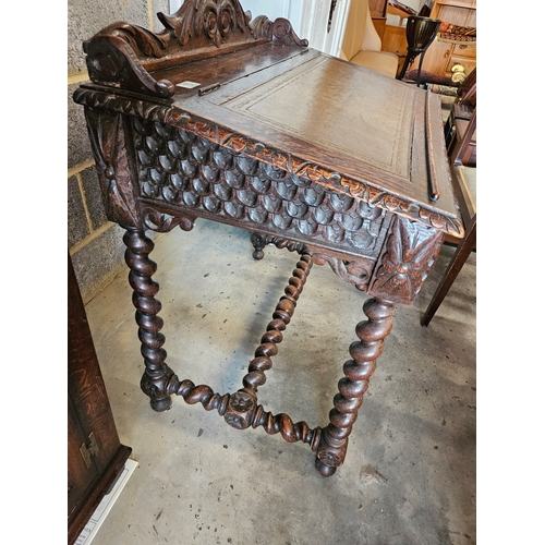 79 - Antique highly carved desk with leather top.