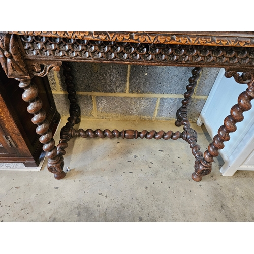 79 - Antique highly carved desk with leather top.