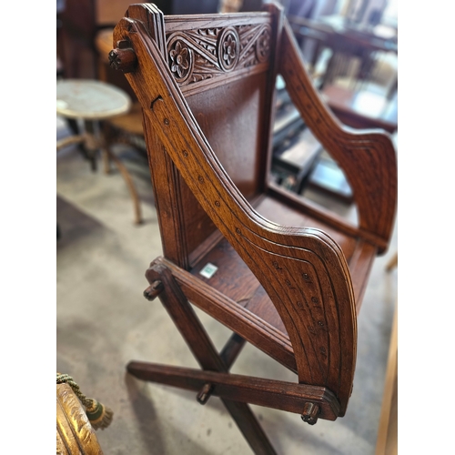 83 - Oak carved Glastonbury style chair