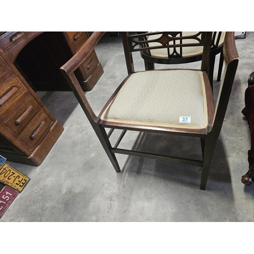 37 - Pair of similar Edwardian armchairs. Both have fine inlay work. Both with the same upholstery