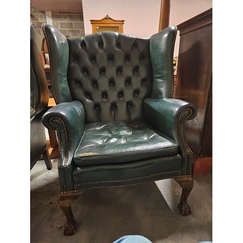 53 - Leather chesterfield wingback armchair. 
Needs a good clean