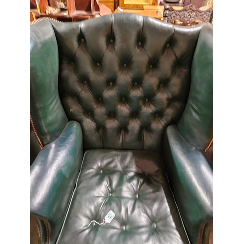 53 - Leather chesterfield wingback armchair. 
Needs a good clean