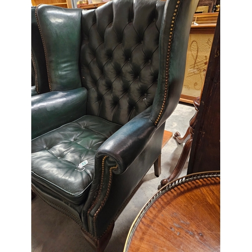 53 - Leather chesterfield wingback armchair. 
Needs a good clean