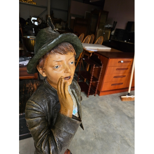 61 - Austrian/ German yodeling boy. In need of restoration (arm missing)