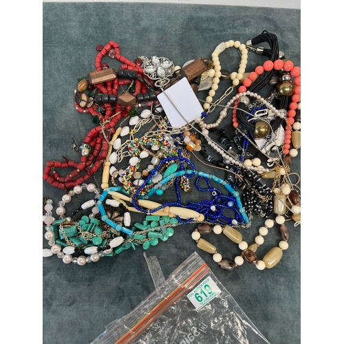 619 - Bag of costume jewelry