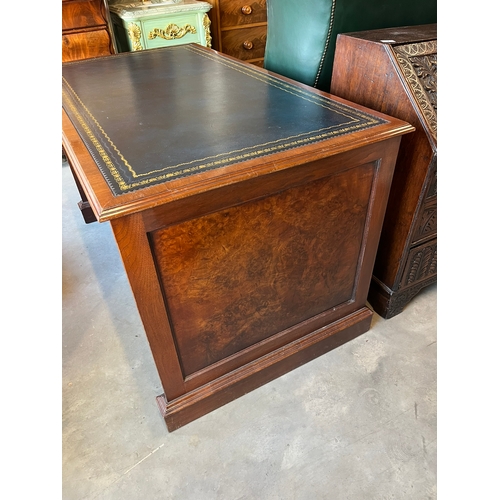 33 - Large leather topped desk with two drawers