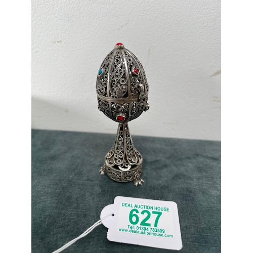 627 - Russian silver filigree egg with lion. With turquoise cabochons