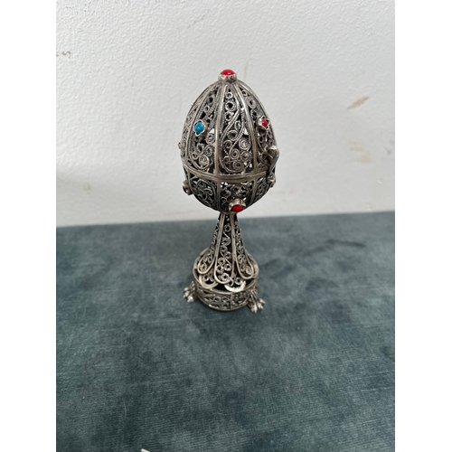 627 - Russian silver filigree egg with lion. With turquoise cabochons