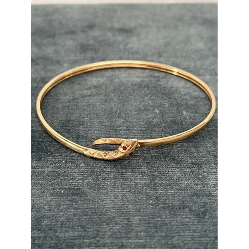 628 - 9ct yellow gold snake bangle - 5g