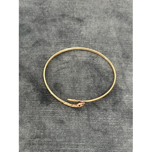 628 - 9ct yellow gold snake bangle - 5g