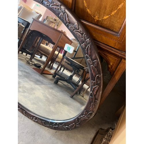 10 - Large oval wall mirror with carved detail