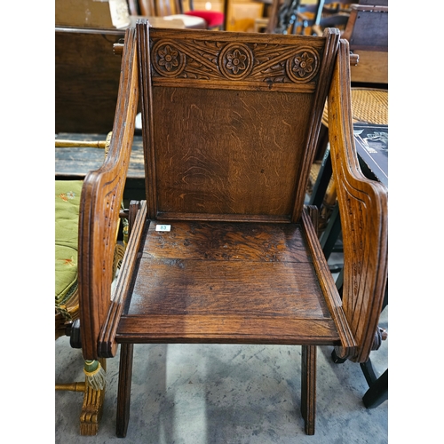 83 - Oak carved Glastonbury style chair