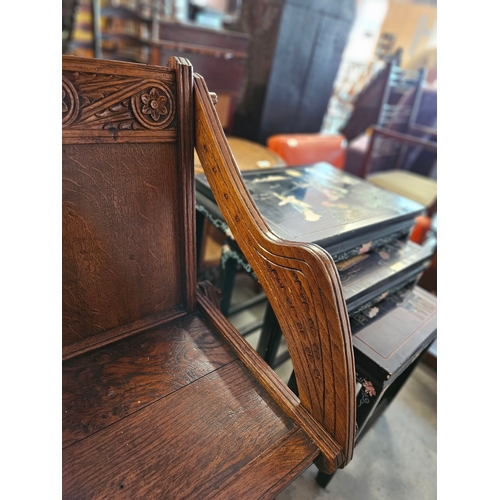 83 - Oak carved Glastonbury style chair