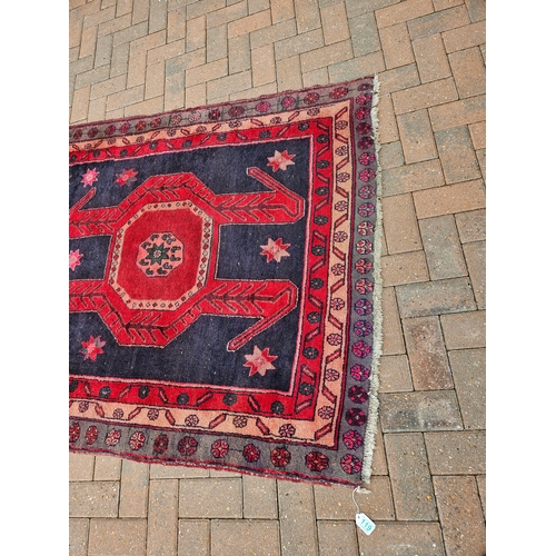 119 - Large antique Aztec design rug

135cm x 336cm