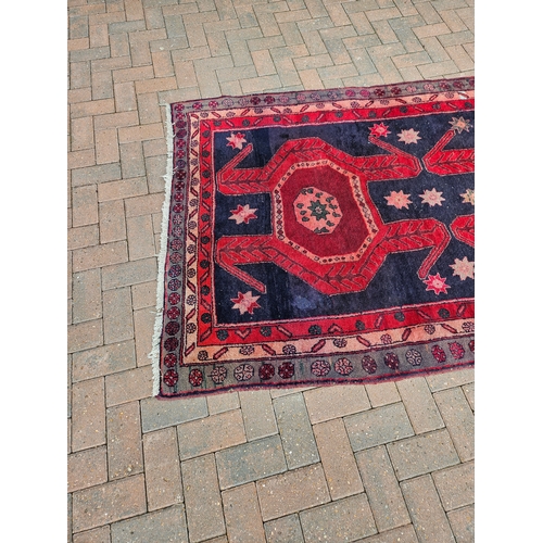 119 - Large antique Aztec design rug

135cm x 336cm